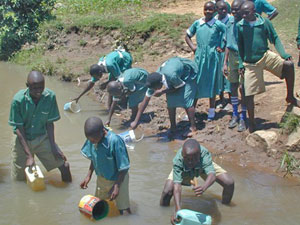 School children collecting dirty water