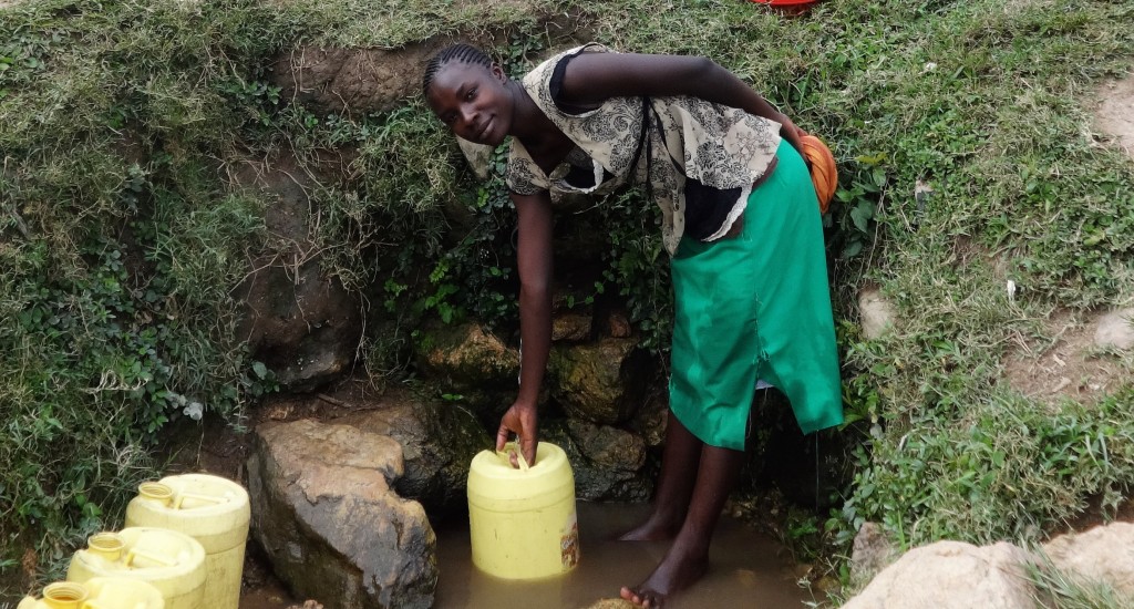 The Water Project : 3-kenya4731-miriam-fetches-water-at-amala-spring