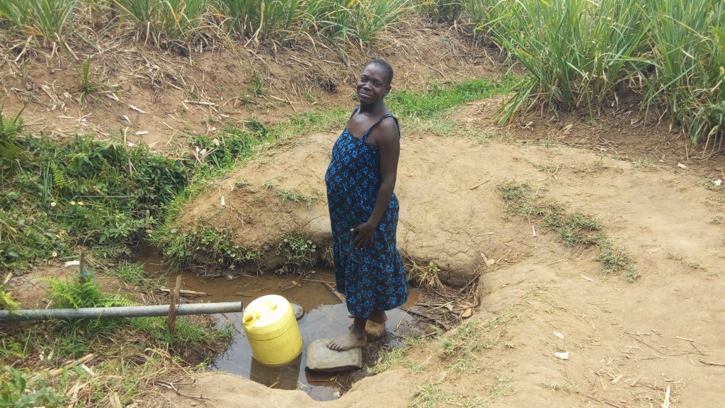 The Water Project : 2-kenya4747-mrs-alice-aliyo-fetching-water
