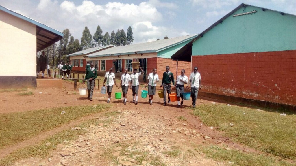 The Water Project : 6-kenya4683-students-coming-back-to-school-with-water