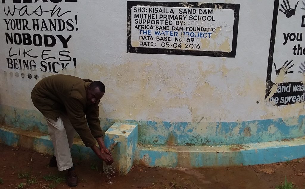 The Water Project : asdf_muthei-primary-school-tank_year-after-report-pics-7
