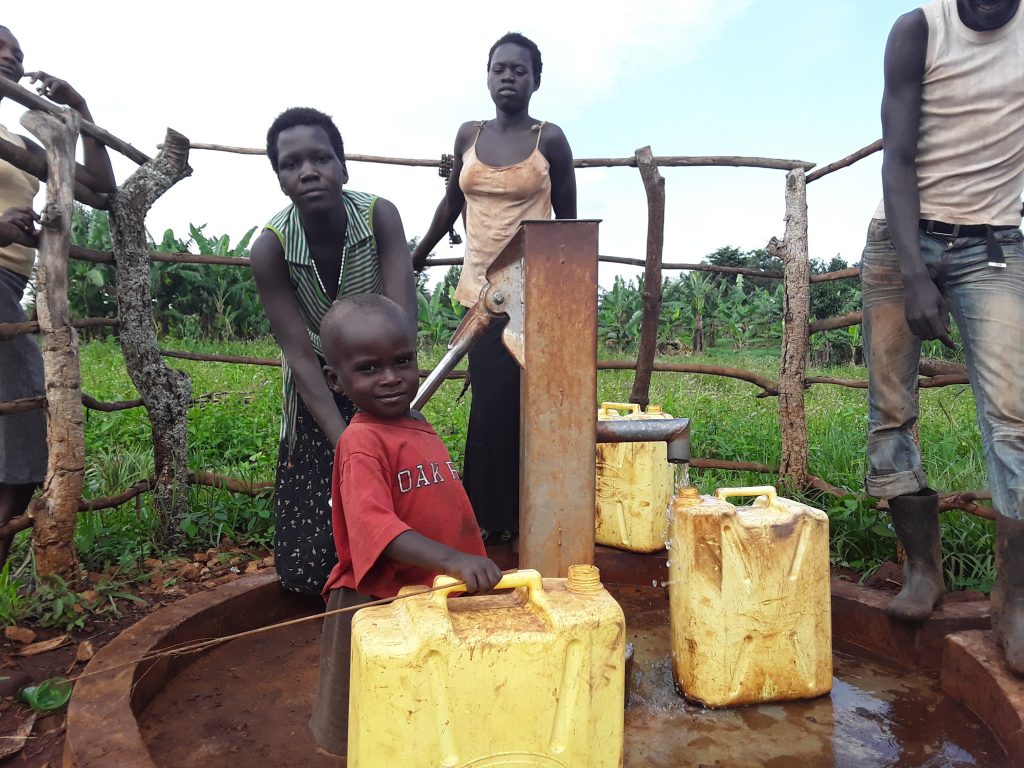 The Water Project : community-members-fetching-water-4