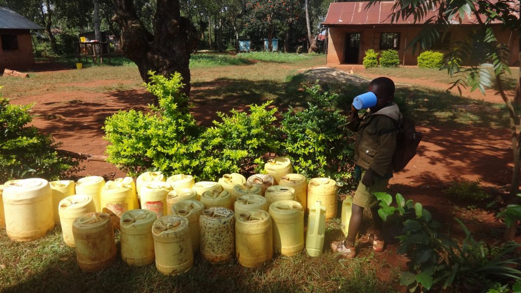 The Water Project : 4-kenya18064-water-containers-used-by-students
