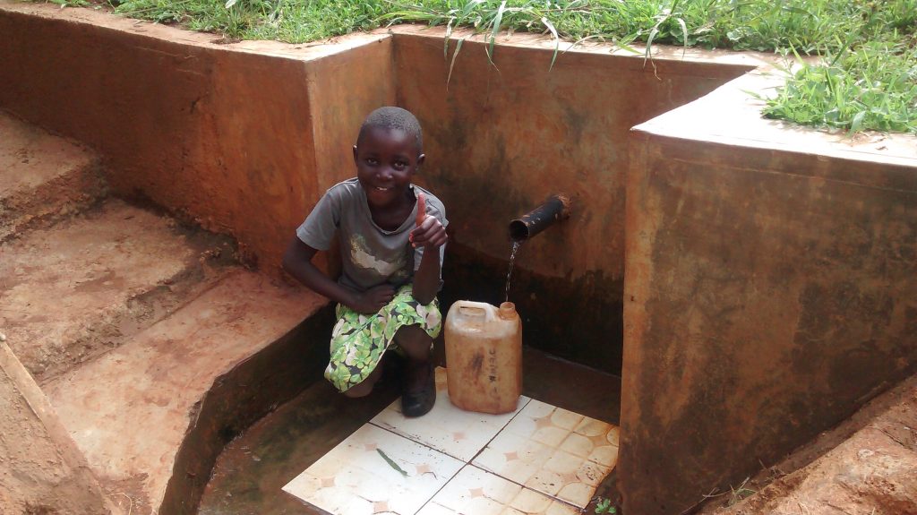 The Water Project : kenya4719-precious-fetches-water