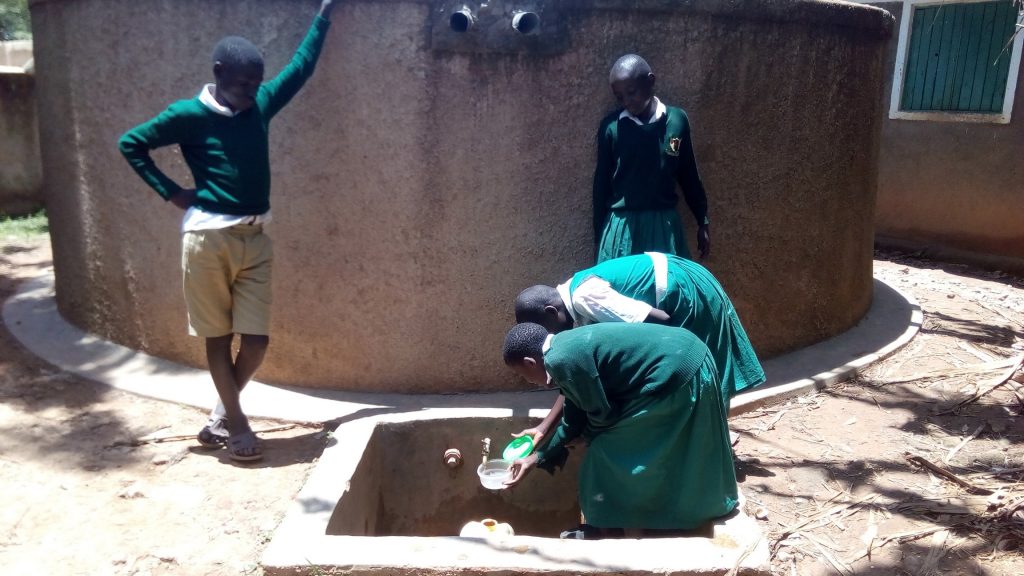 The Water Project : kenya4658-girls-fetch-water-at-the-school
