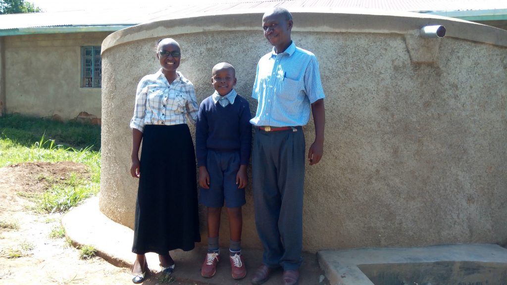 The Water Project : kenya4836-field-officer-joan-were-churchill-imbenzi-and-phillip-sunguti