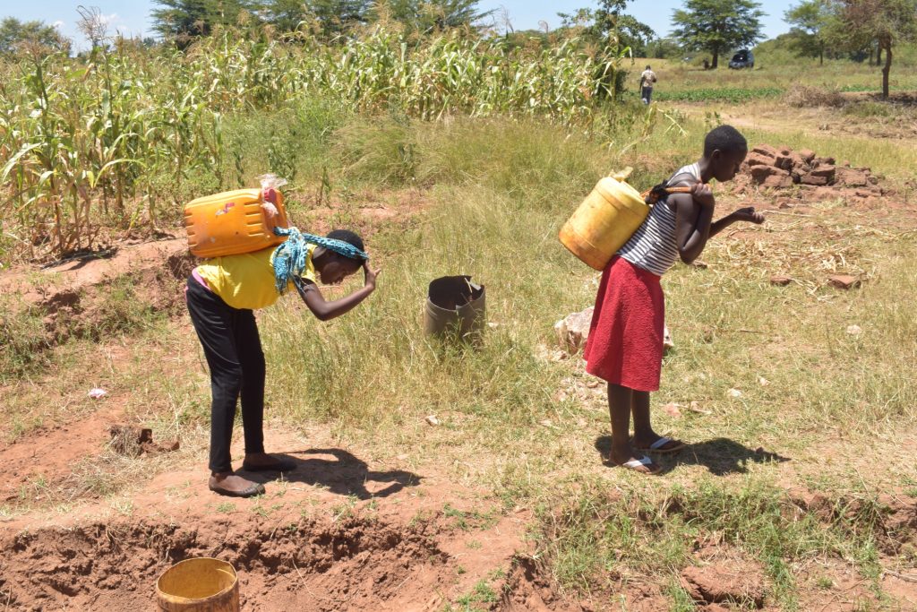 The Water Project : kenya19201-carrying-water-2