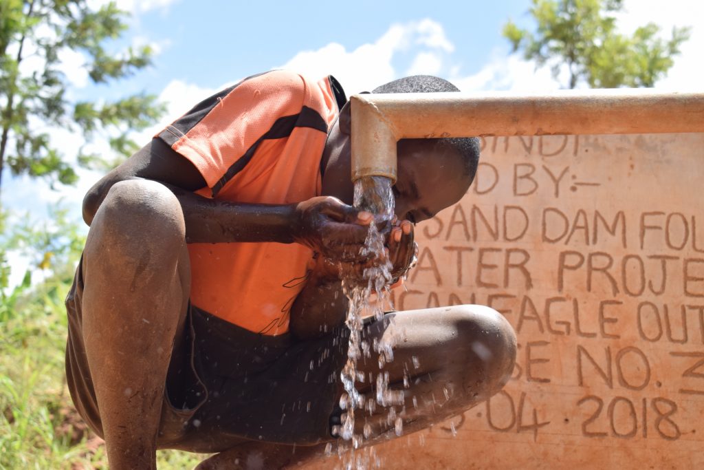 The Water Project : kenya18175-drinking-water-from-the-well