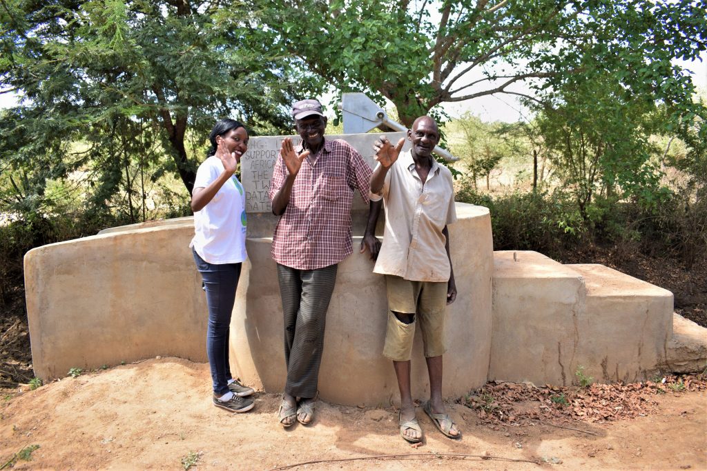 The Water Project : kenya18182-community-members-at-the-well