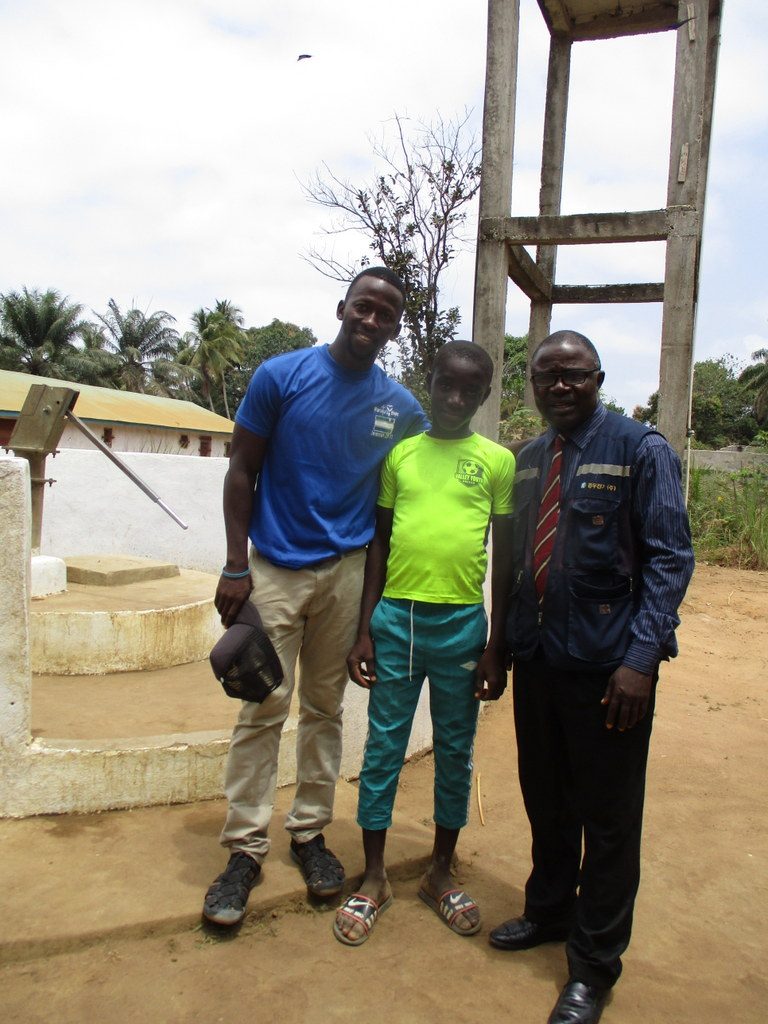 The Water Project : sierraleone18274-staff-with-the-two-interviewed-people