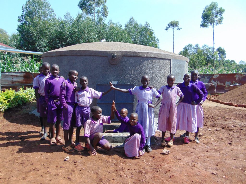 The Water Project : 24-kenya19042-students-with-the-new-tank