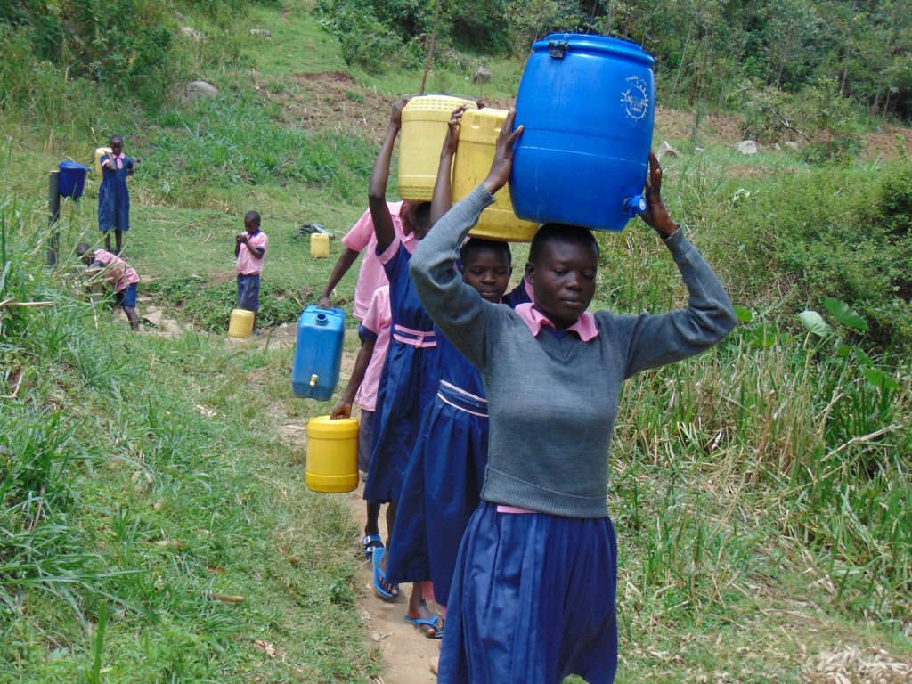 The Water Project : 23-kenya20117-students-carrying-water-5