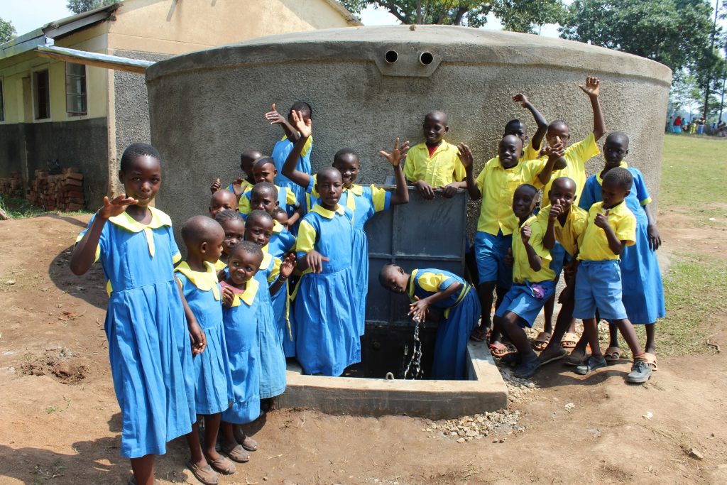 The Water Project : 37-kenya19056-students-celebrate-the-tank