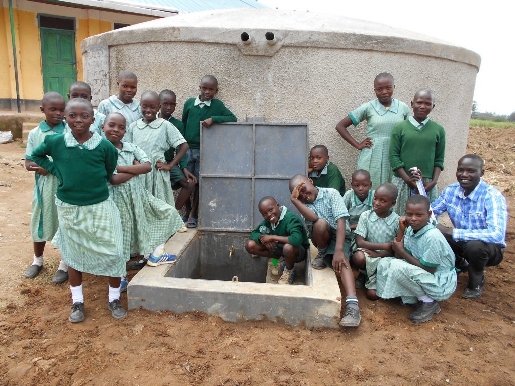 The Water Project : 40-kenya19077-students-and-staff-pose-with-rain-tank