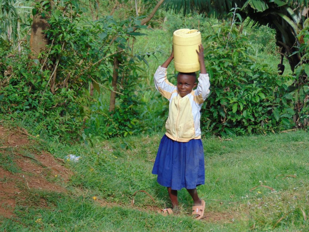 The Water Project : 2-kenya20119-student-carrying-water