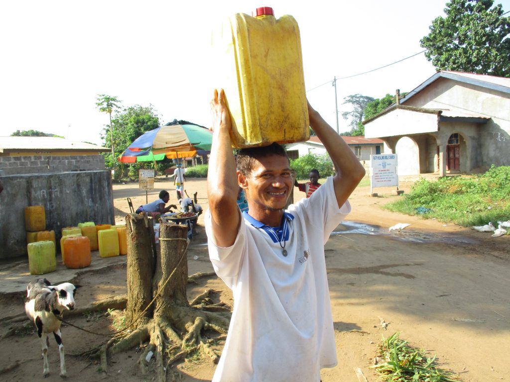 The Water Project : sierraleone20404-boy-carrying-water