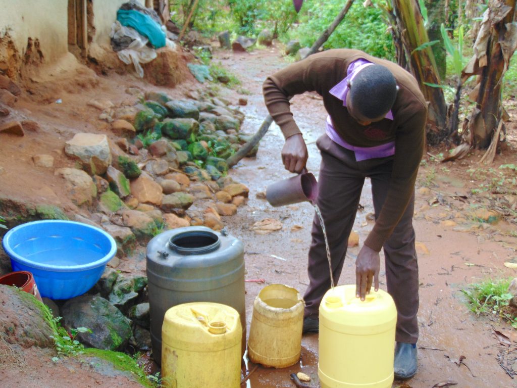 The Water Project : 22-kenya20148-student-collects-water-at-home