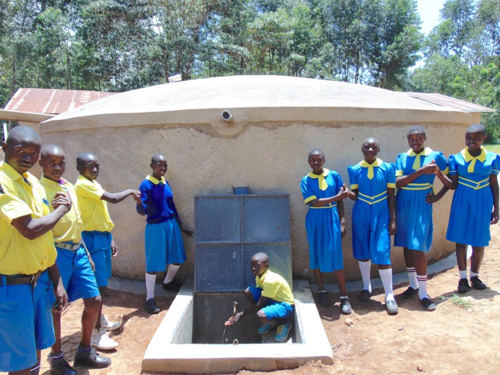 The Water Project : 42-kenya20103-pupils-pose-with-rain-tank