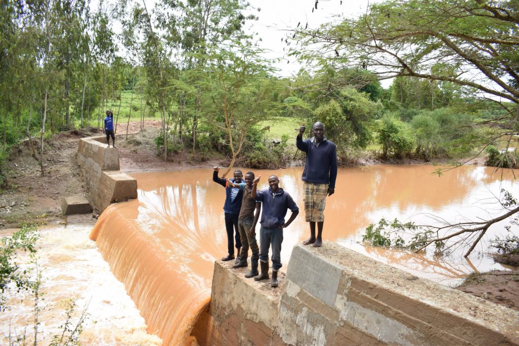 The Water Project : kenya19201-shg-members-at-the-dam