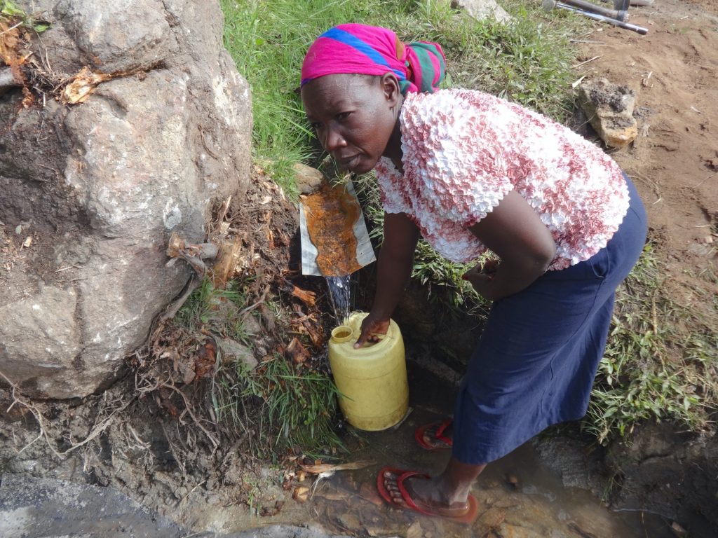 The Water Project : 26-kenya20183-collecting-water-2