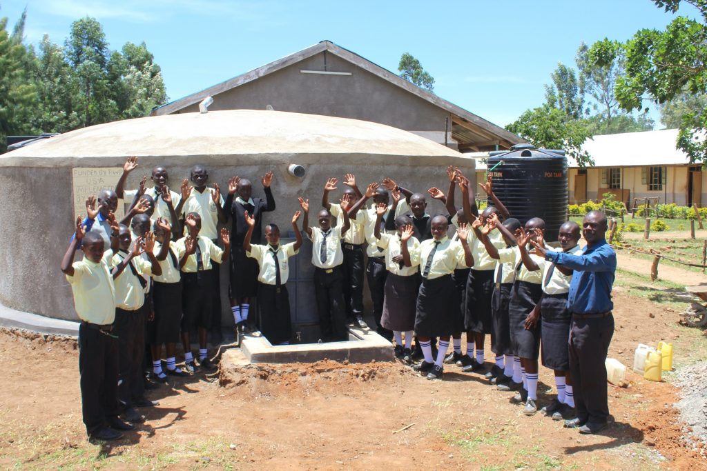 The Water Project : 42-kenya20107-pupils-and-staff-celebrate-the-new-rain-tank-1