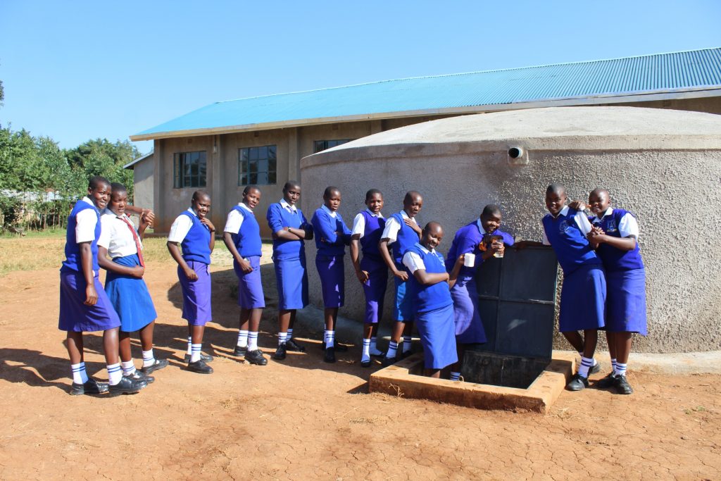 The Water Project : 33-kenya20104-students-posing-at-the-new-rain-tank-2