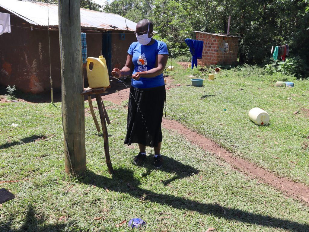 The Water Project : covid19-kenya18124-an-insatlled-handwashing-leaky-tin-in-the-community