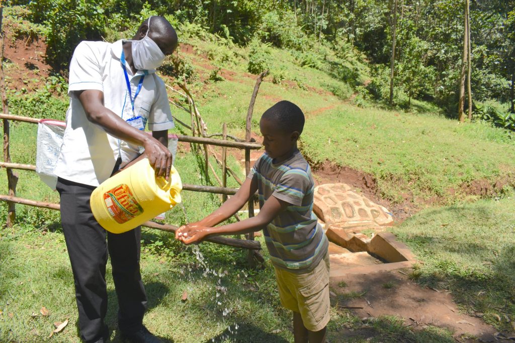 The Water Project : covid19-kenya19103-handwashing-demonstration-2