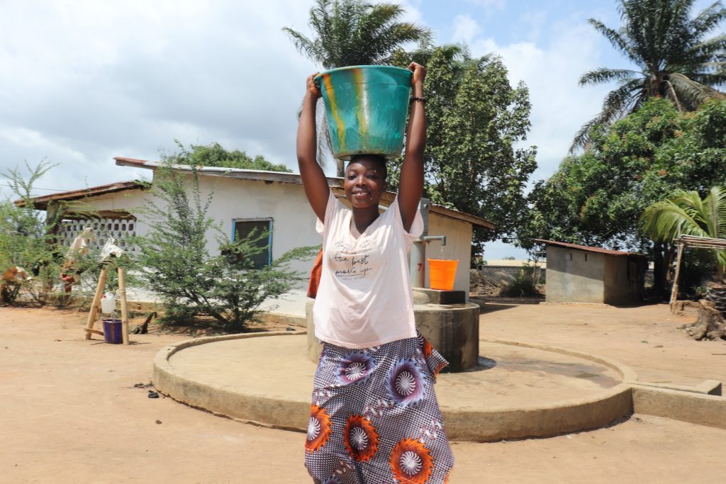 The Water Project : sierraleone20429-carrying-water-3