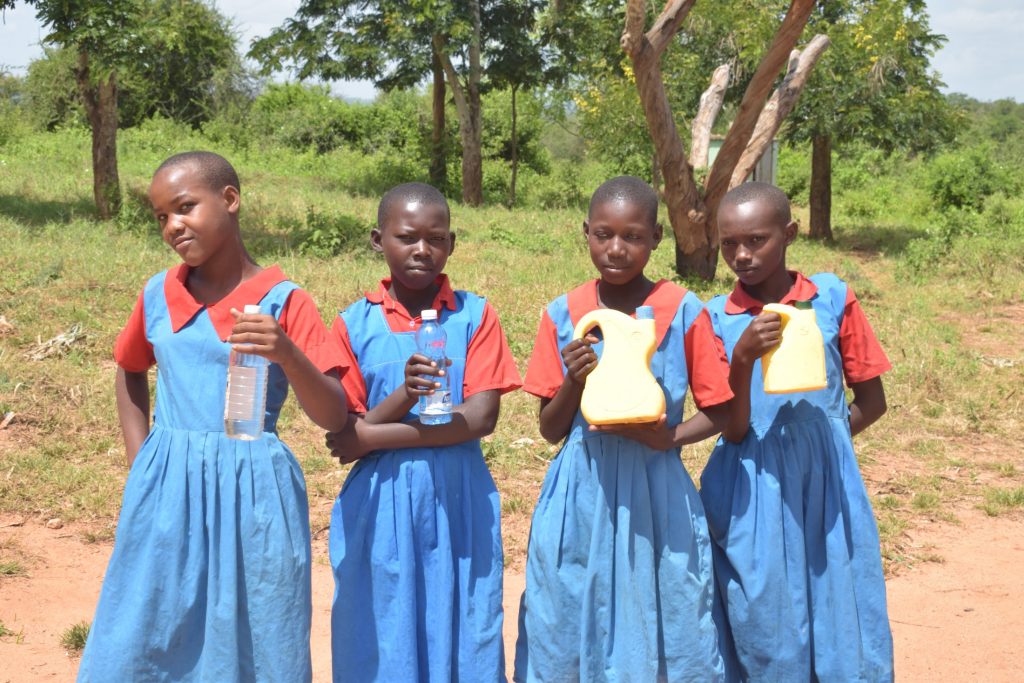The Water Project : kenya20363-students-hold-water-containers
