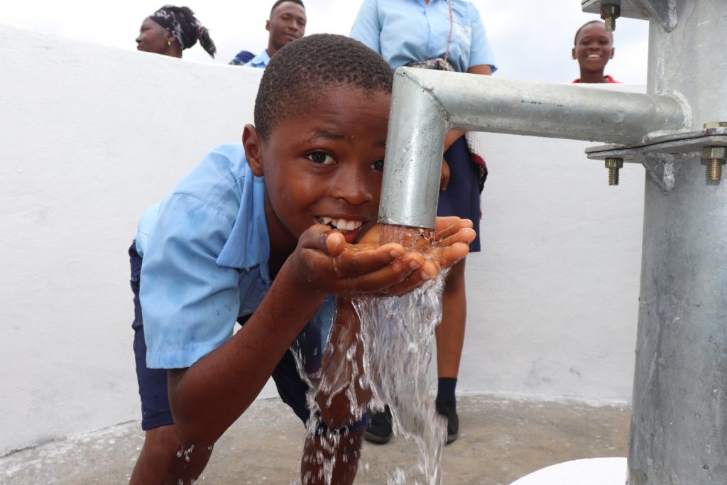 The Water Project : sierraleone20409-student-drinking-clean-and-safe-water-1
