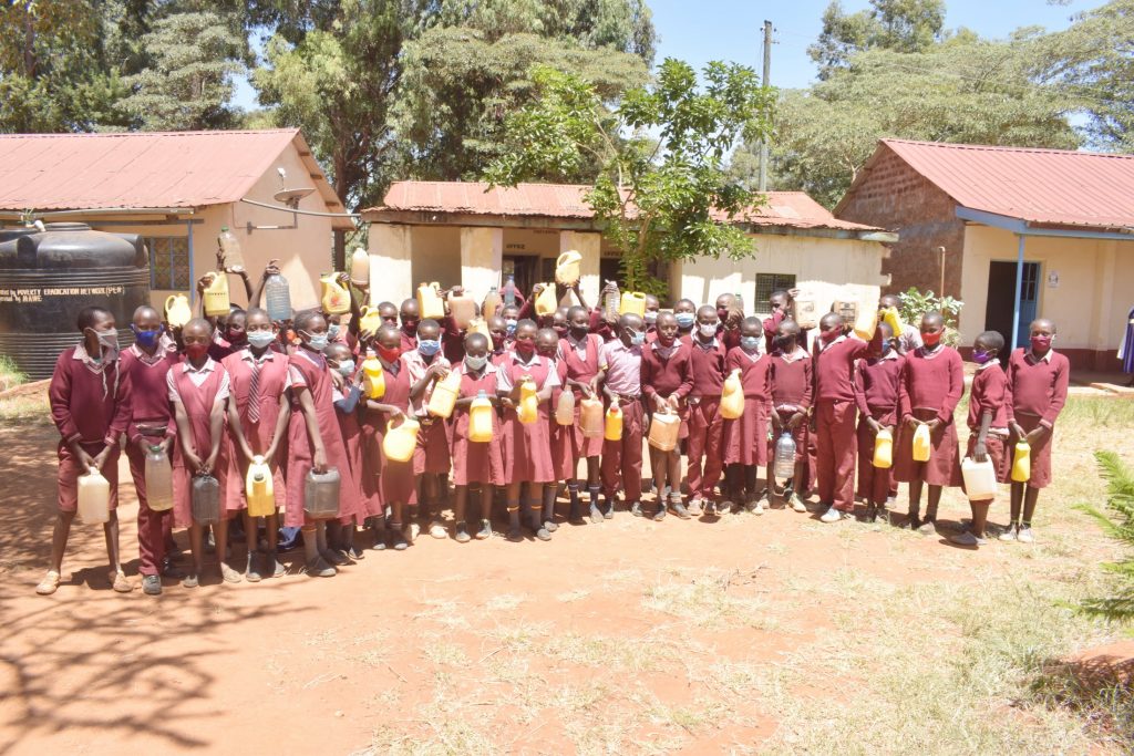 The Water Project : kenya21460-students-holding-water-buckets-from-home