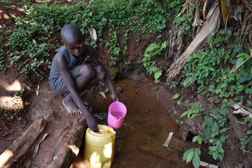 The Water Project : kenya21079-elizabeth-collecting-water-8