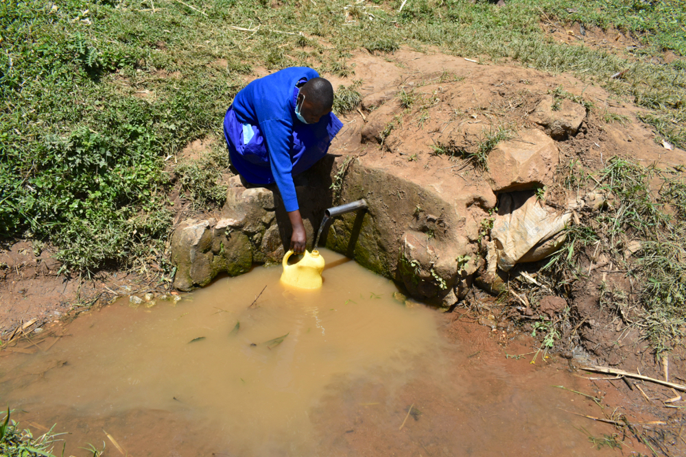 The Water Project : kenya21238-collecting-water-at-the-spring-2