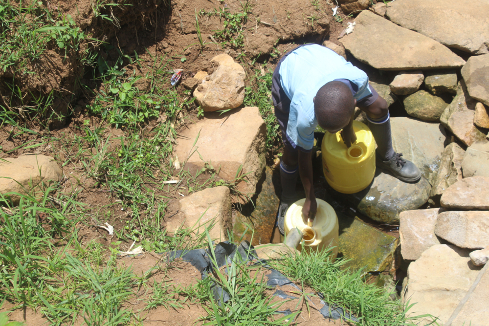 The Water Project : kenya21312-flevian-collecting-water-1