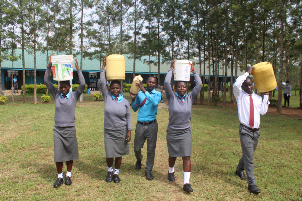 The Water Project : kenya21357-students-carrying-water-3