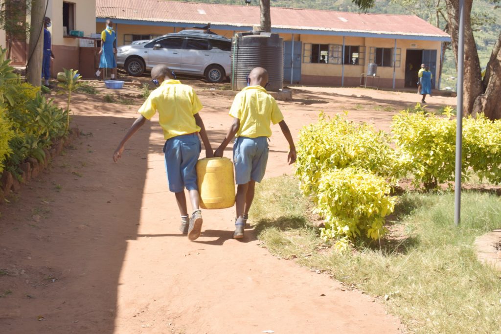 The Water Project : kenya21466-carrying-water-2-17
