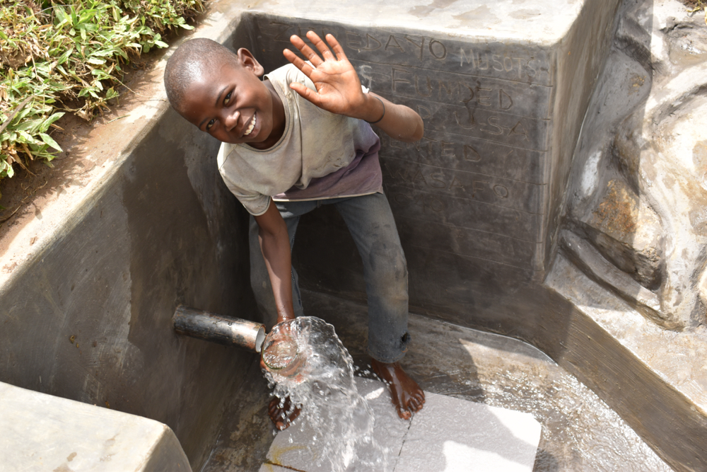 The Water Project : kenya21040-paul-happy-about-the-new-water-source-3