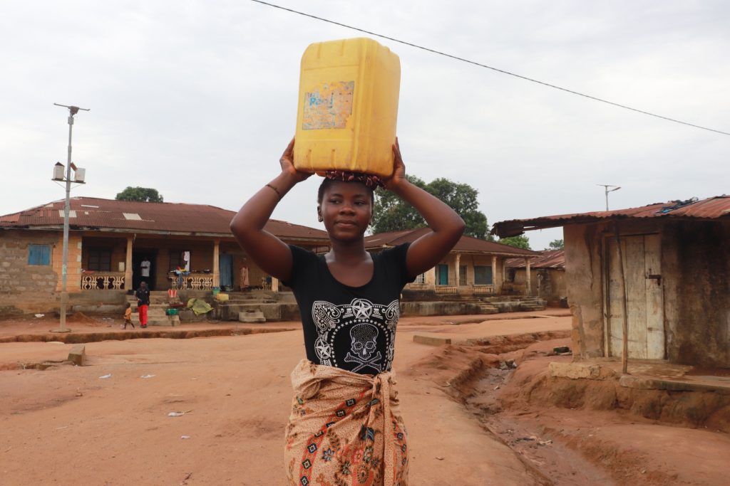 The Water Project : sierraleone21552-woman-carrying-water-3
