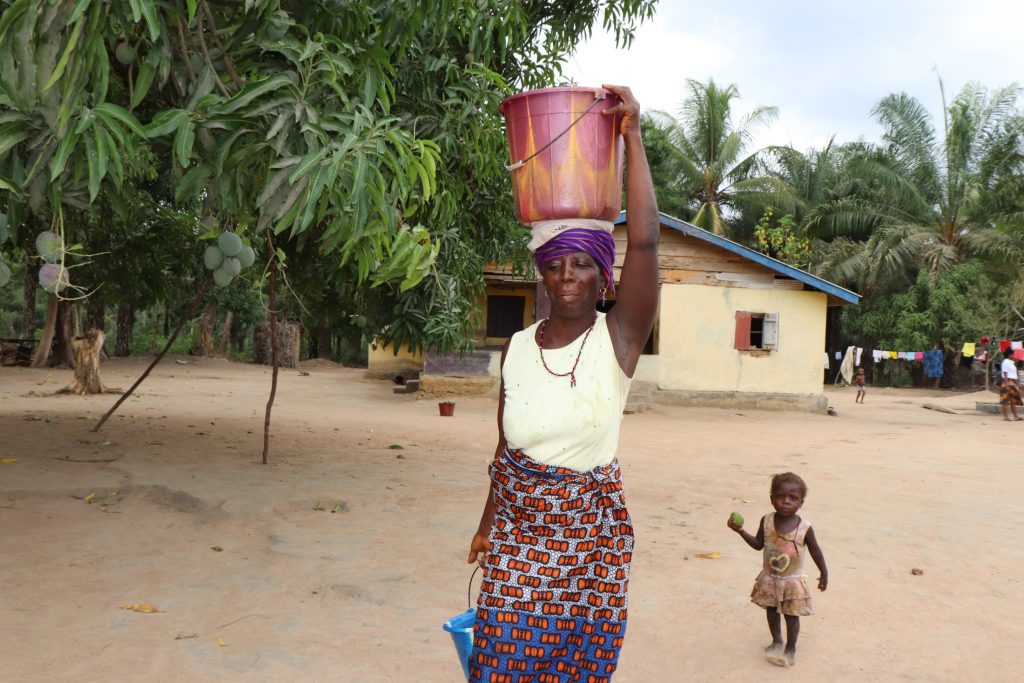The Water Project : sierraleone21559-woman-carrying-water-2-2