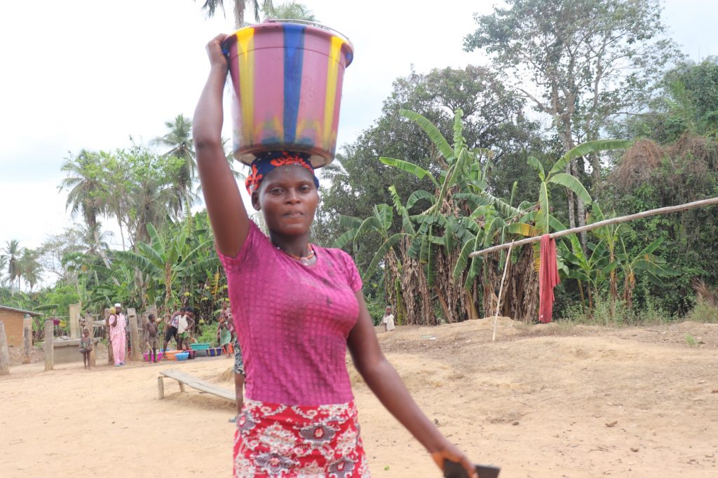 The Water Project : sierraleone21566-woman-carrying-water-2