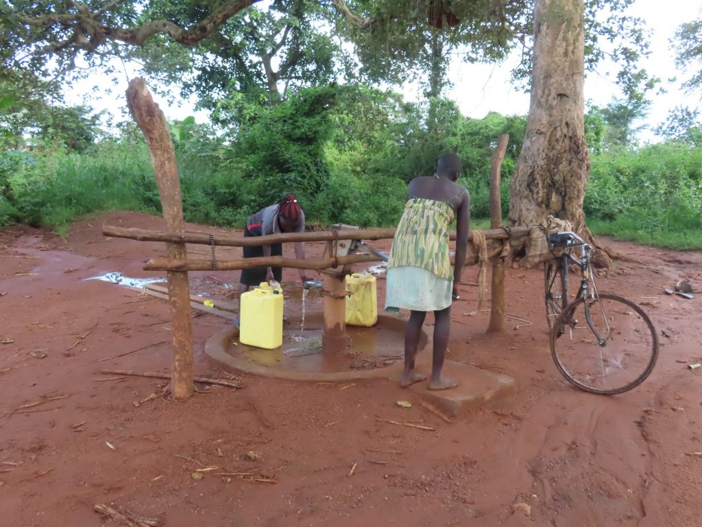 The Water Project : uganda21619-collecting-water-2-2