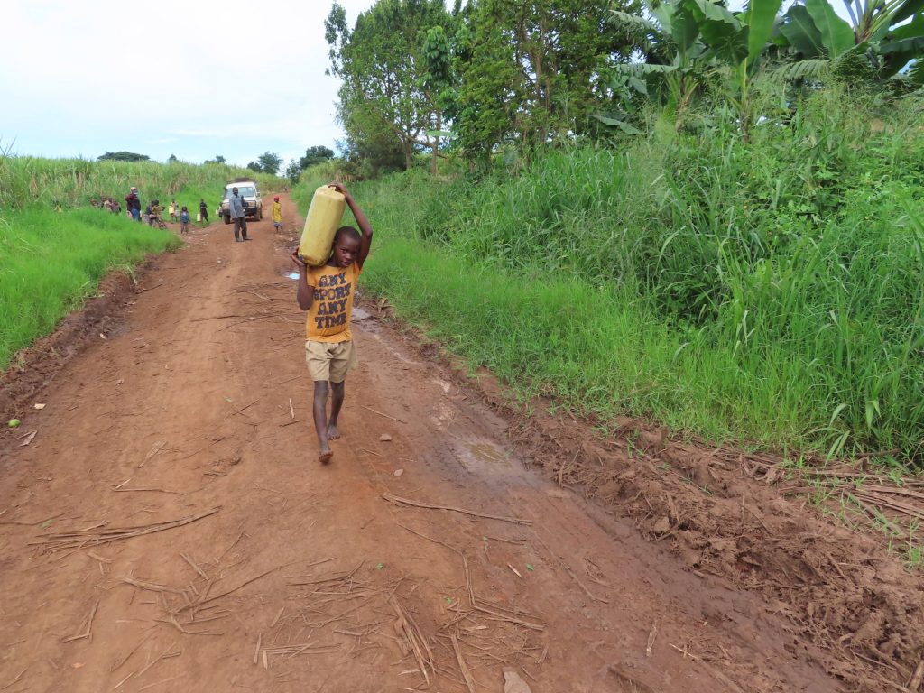 The Water Project : uganda21613-carrying-water
