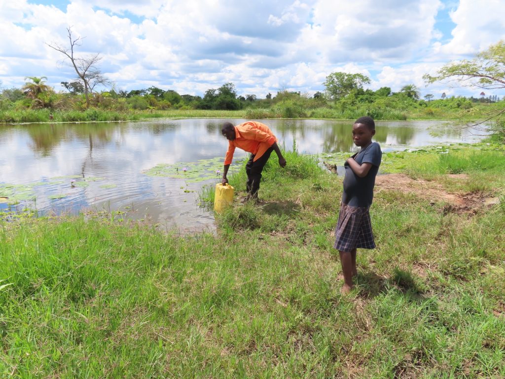 The Water Project : uganda21615-open-water-source-1