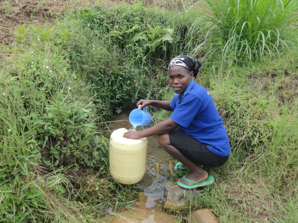The Water Project : kenya20202-collecting-water-2-2