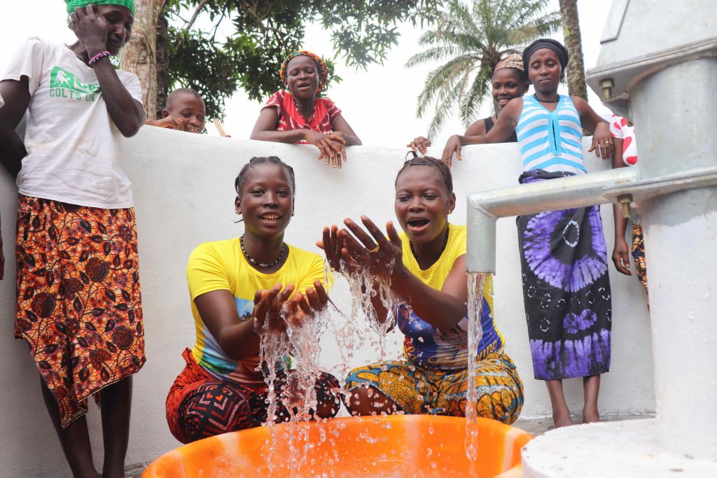 The Water Project : sierraleone21524-0-women-splashing-water