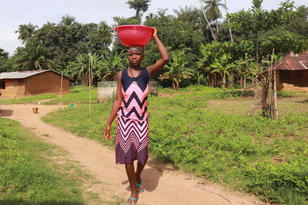 The Water Project : sierraleone22606-carrying-water-4