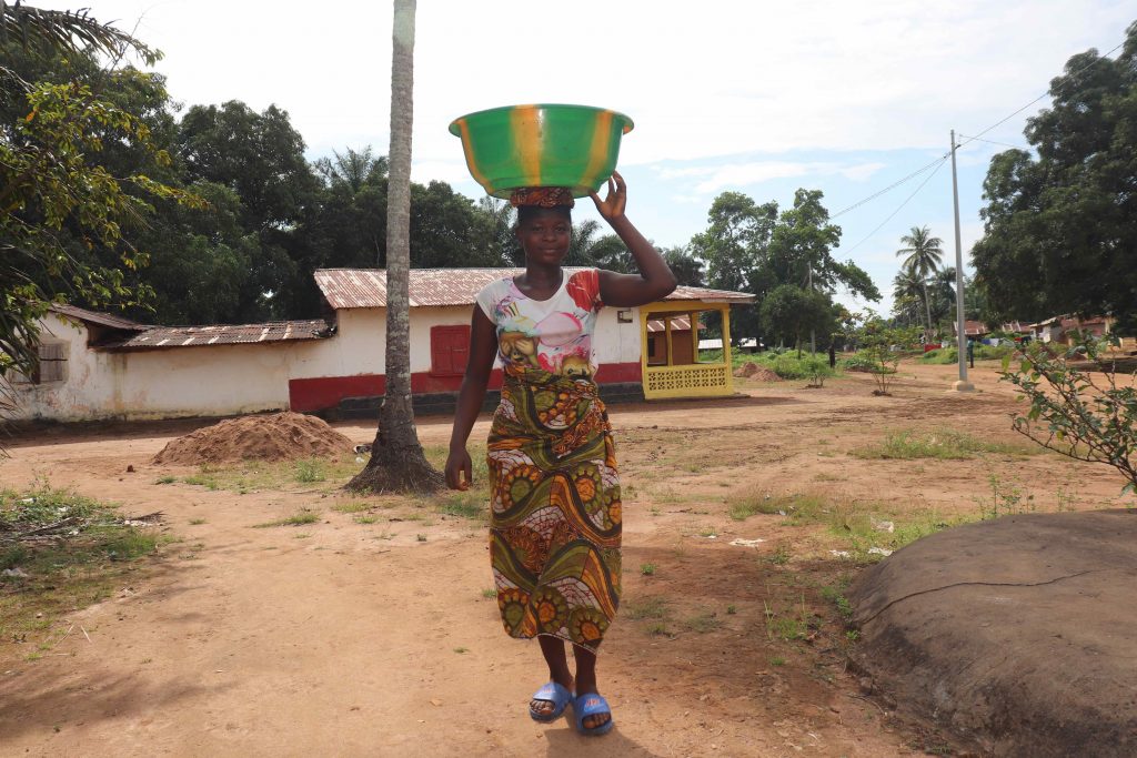 The Water Project : sierraleone22619-carrying-water-3