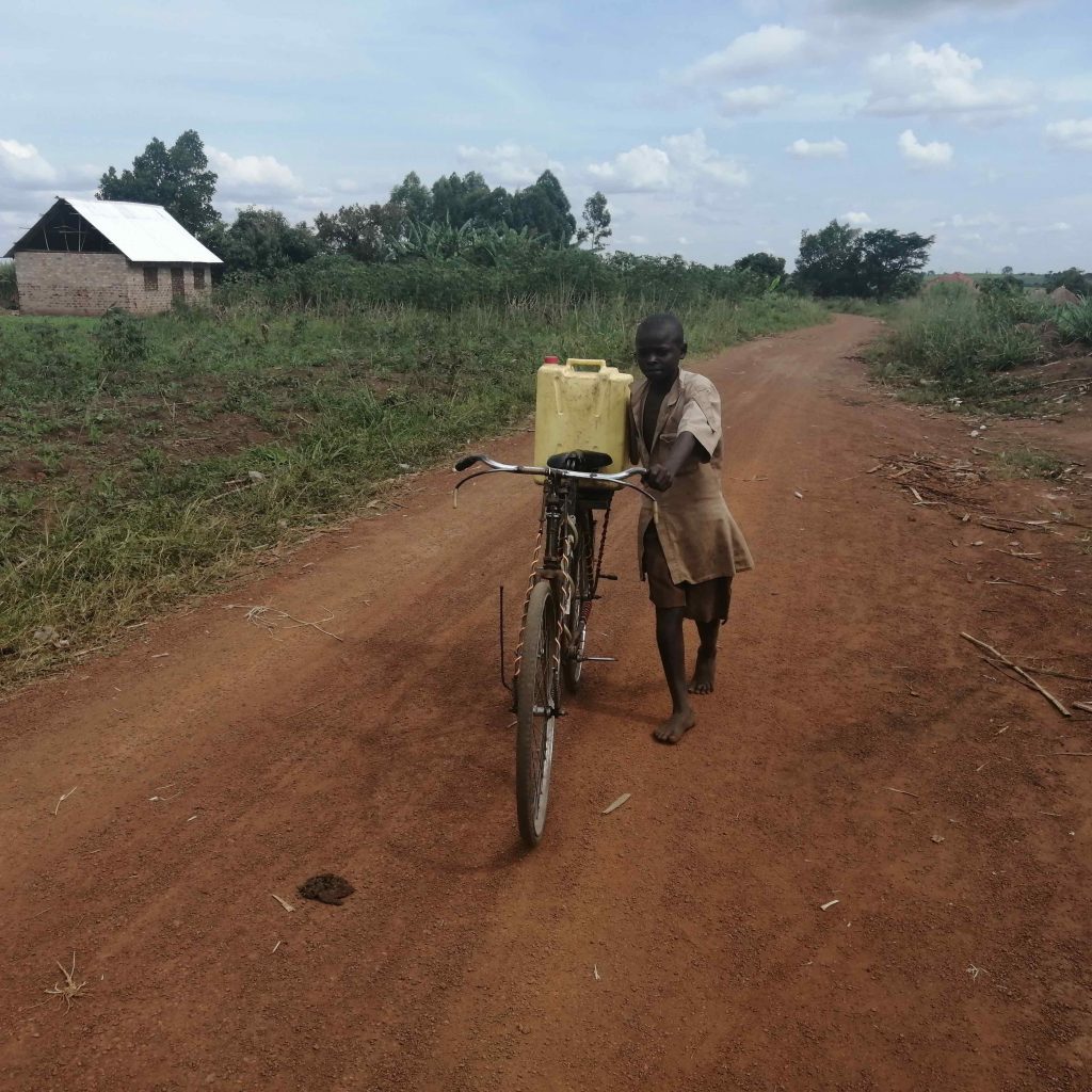 The Water Project : uganda22703-gloria-fetching-water