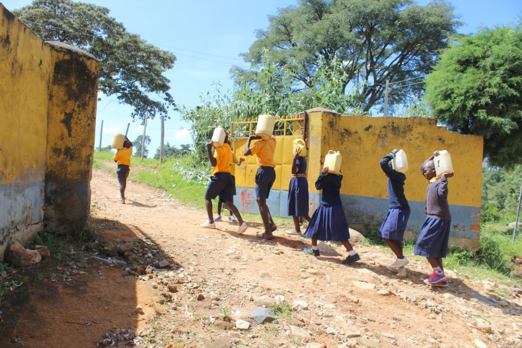 The Water Project : 41-kenya20122-students-carrying-water-1-2